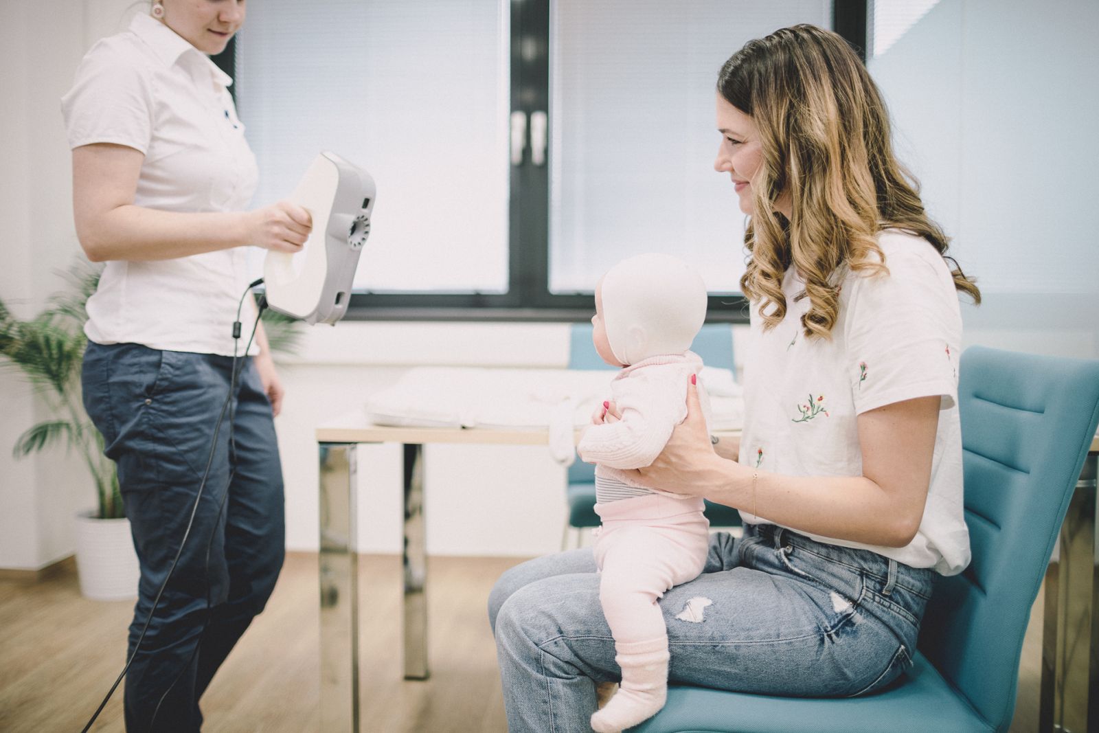 Baby being scanned for cranial remolding orthosis